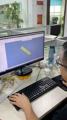 TUODI employee working with a three-dimensional product model on screen