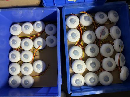 Round sensor units arranged in factory bins